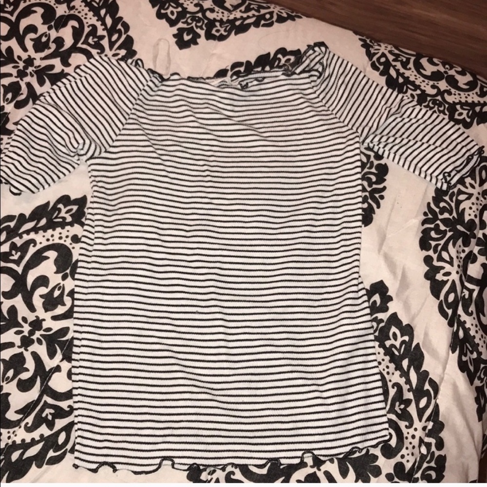 Super cute kind of off shoulder shirt.